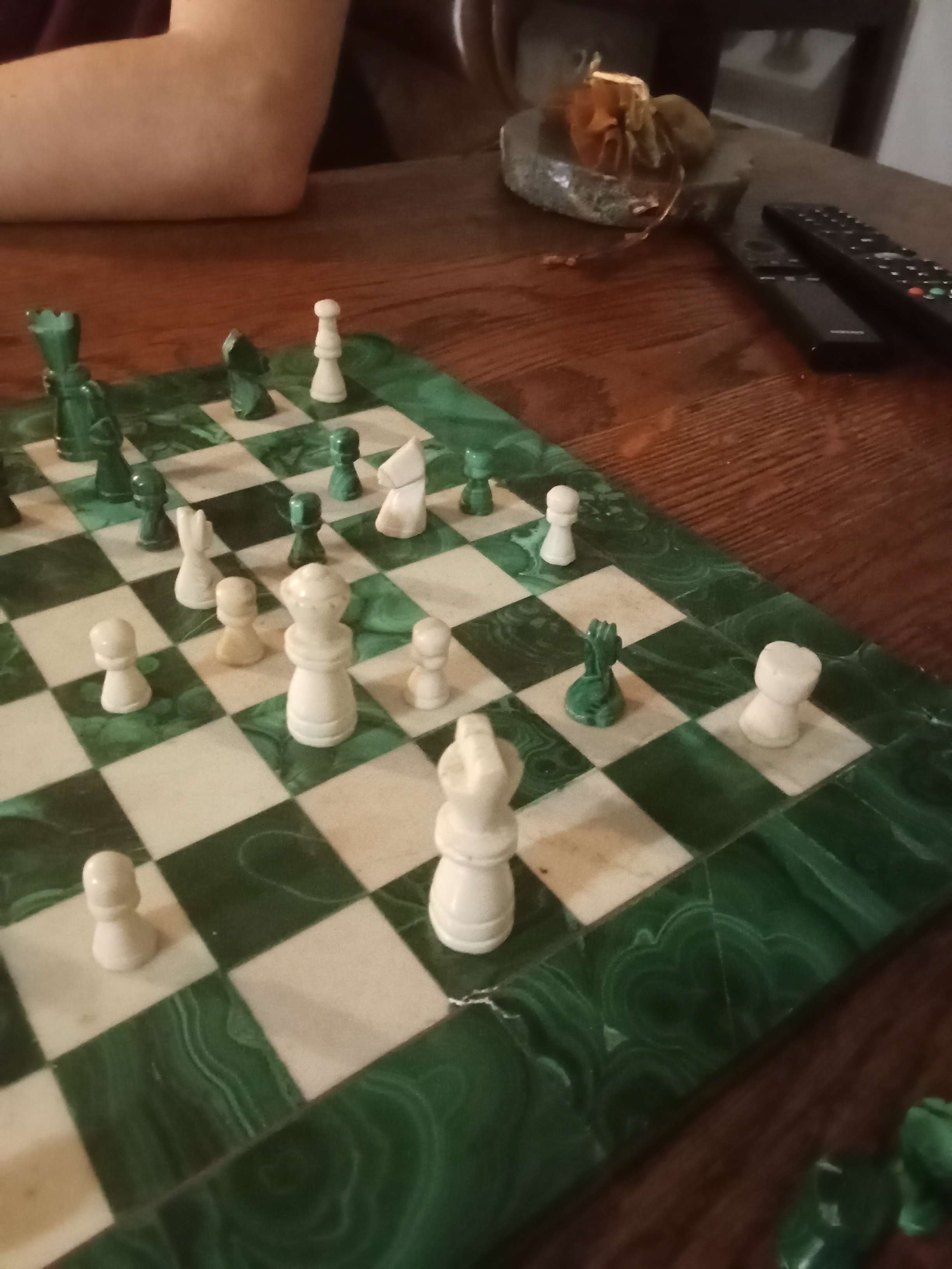 i think the chess set is made from marble and a green stone whose name i forgot! very informative, i know. also while playing with my sister, she broke a bishop so uhhh it ain't all like that anymore! but gramps fixed it no worries